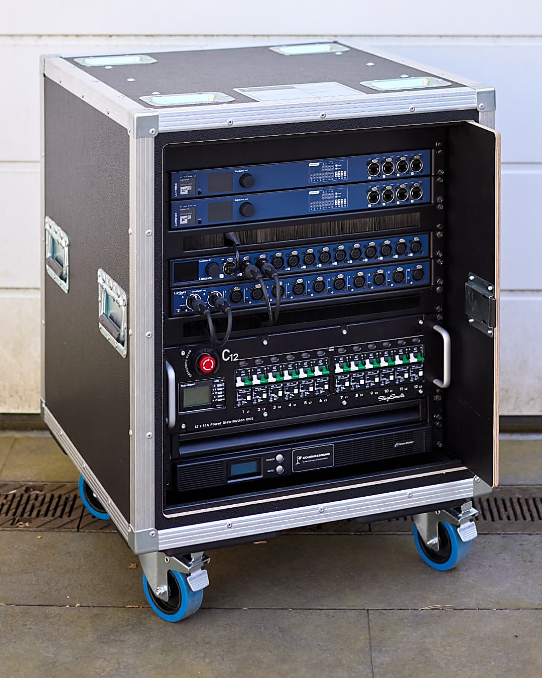 Pre-configured touring rack with power distribution, network nodes and DMX patch